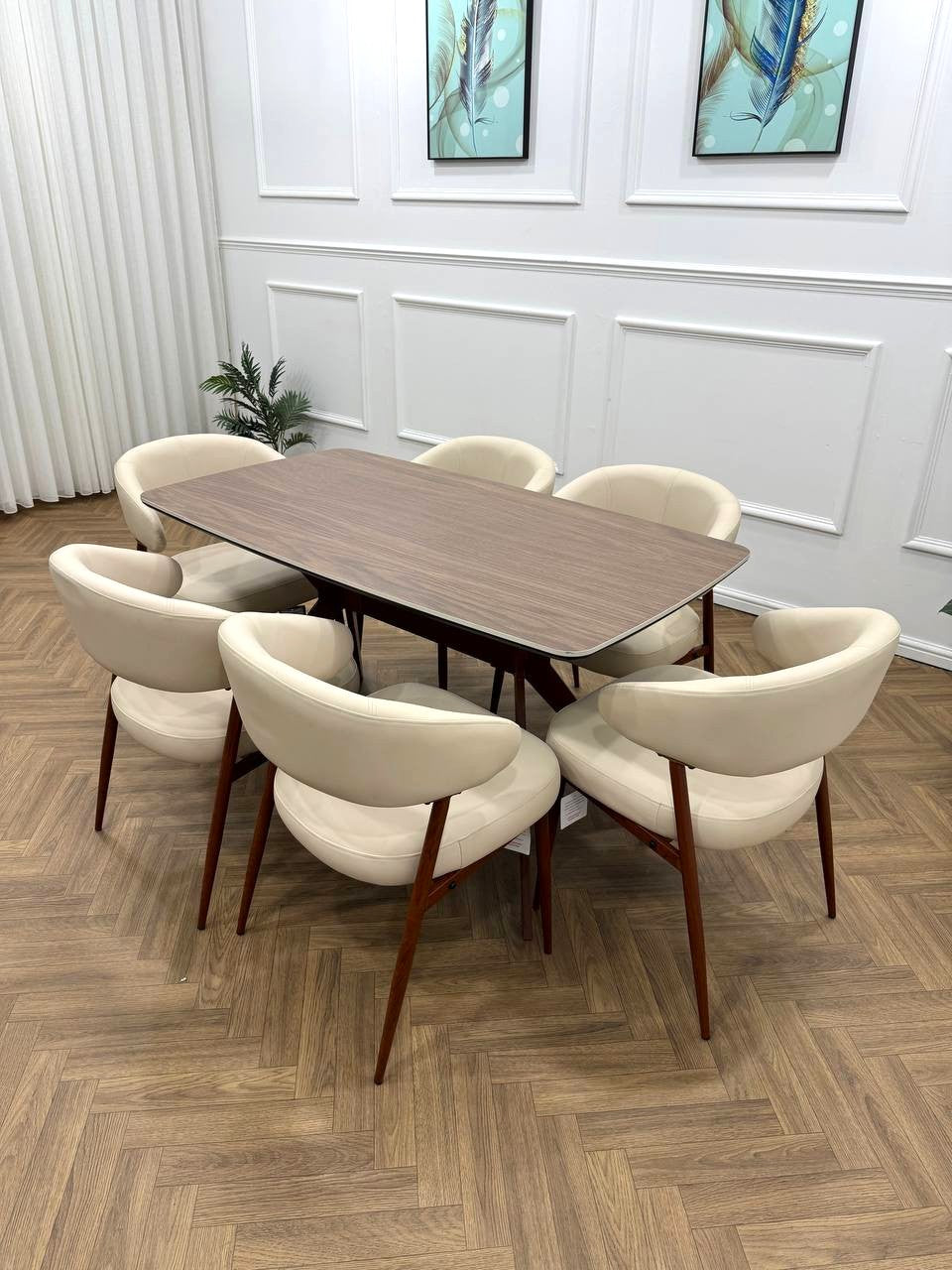 Q&P Furniture Zino beige dining table with a sleek wooden surface and modern design, perfect for contemporary dining rooms.