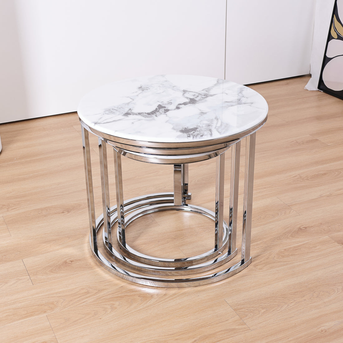 Q&P Furniture Monaco Nesting Coffee Tables set with sleek wooden surfaces and modern design, shown stacked together.