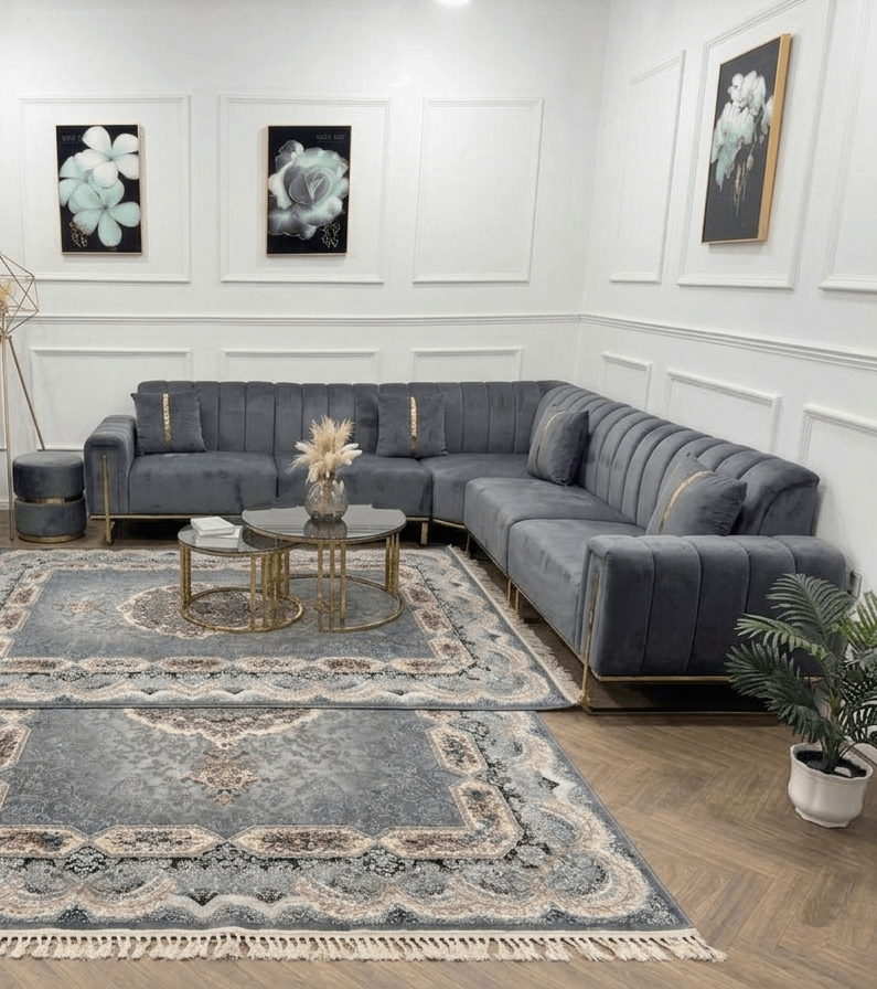 Q&P Furniture New London corner sofa in grey fabric, showcasing plush cushions and modern design in a living room setting.
