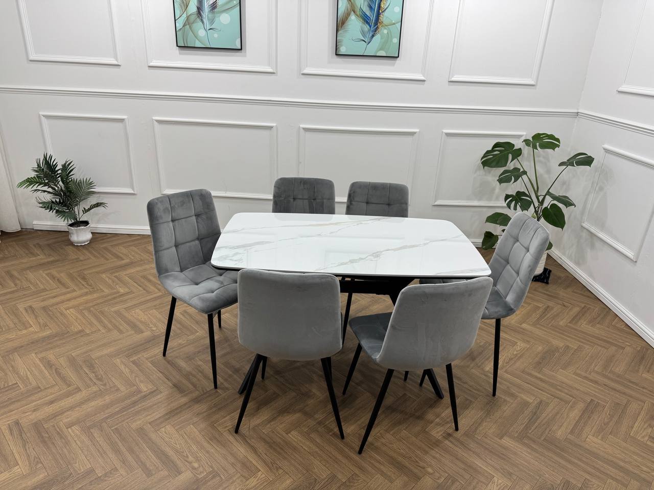 Q&P Furniture Niva dining table, wooden surface with sleek modern design, suitable for contemporary dining rooms.