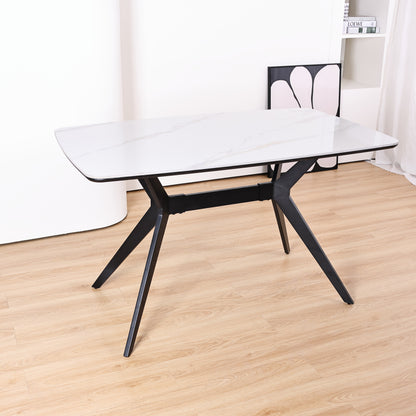 Q&amp;P Furniture Niva dining set with a rectangular wooden dining table and matching chairs in a modern design.