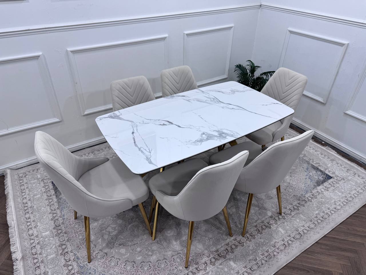 Q&amp;P Furniture Paris dining table set featuring a modern wooden table with matching chairs for elegant dining space.