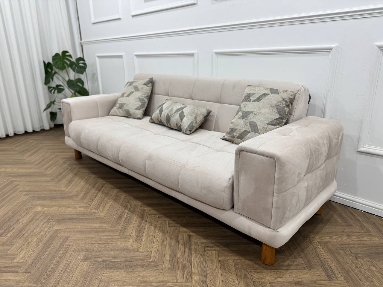 Q&amp;P Furniture Flora velvet sofa set with plush cushions and sleek design, perfect for modern living room decor.