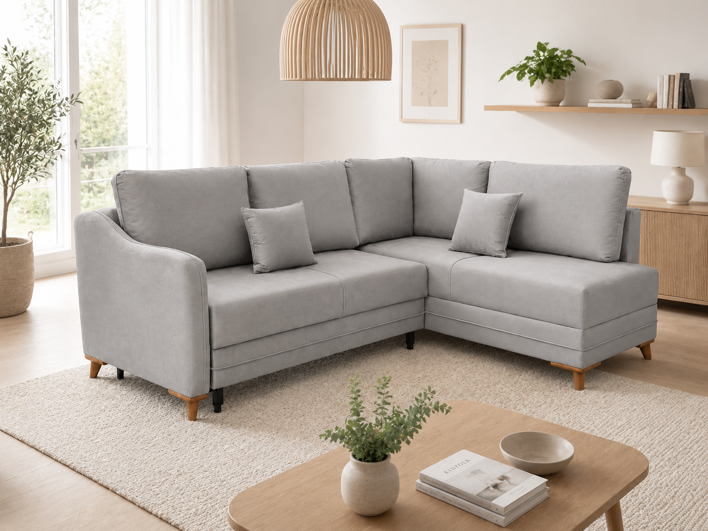 Q&amp;P Furniture Oxford corner sofa bed with built-in storage, featuring plush cushions and a modern design in a stylish fabric.