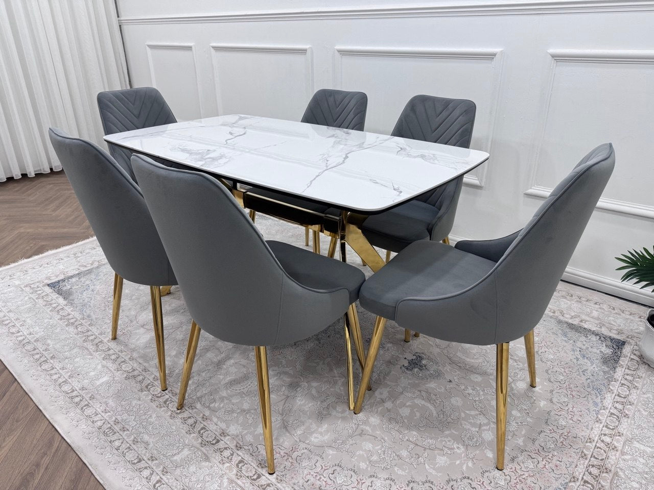 Q&amp;P Furniture Paris dining table set with a modern wooden table and matching chairs in a stylish dining room setting.
