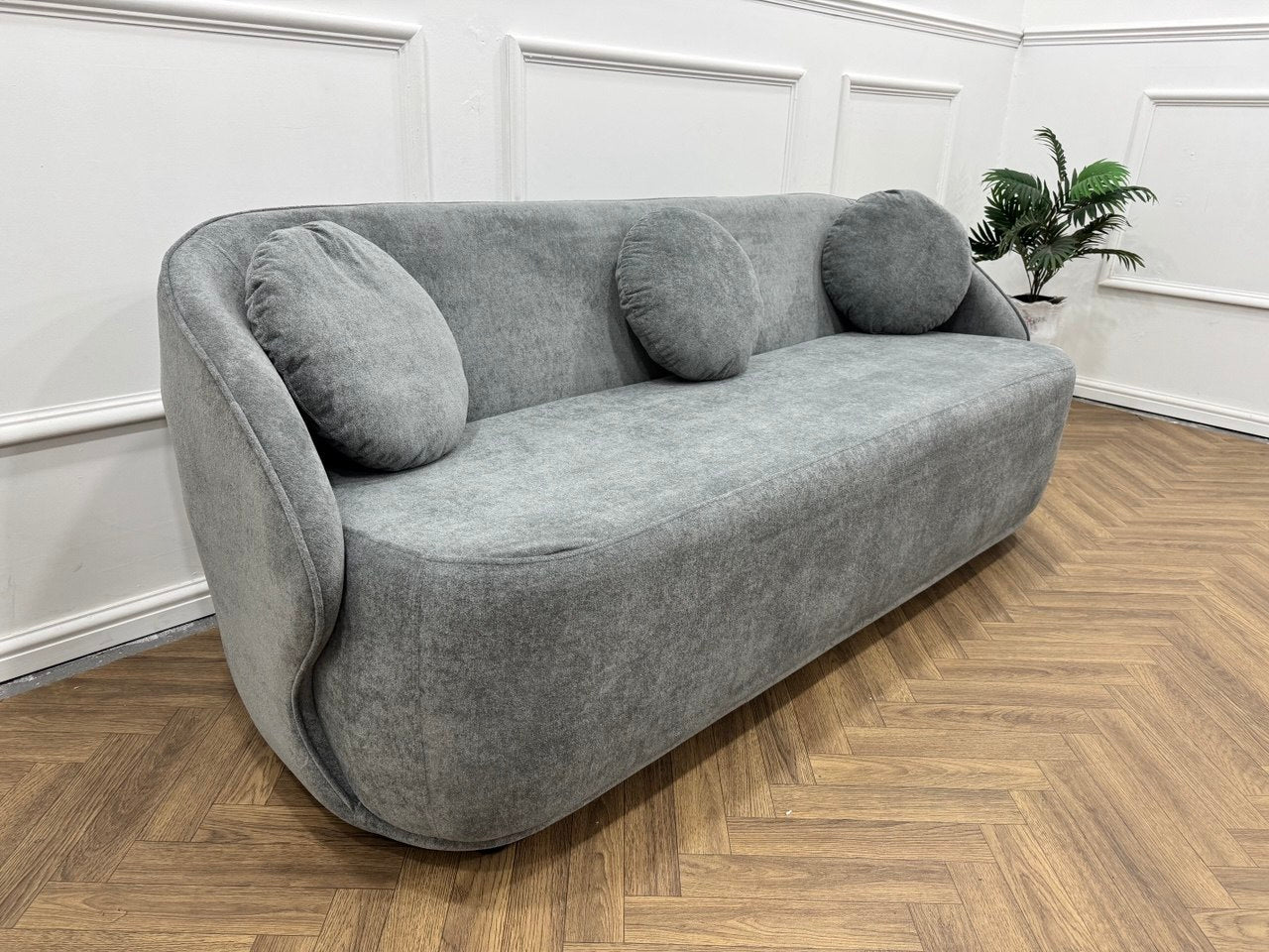 Q &amp; P Furniture Luna sofa set featuring plush cushions, modern design, and a sleek fabric finish in a stylish living room setting.