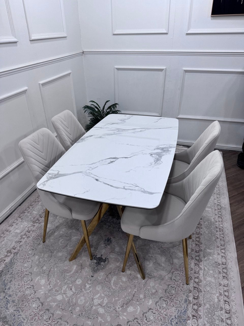 Q&amp;P Furniture Paris dining table set with a wooden table and matching chairs, ideal for modern kitchen or dining room decor.