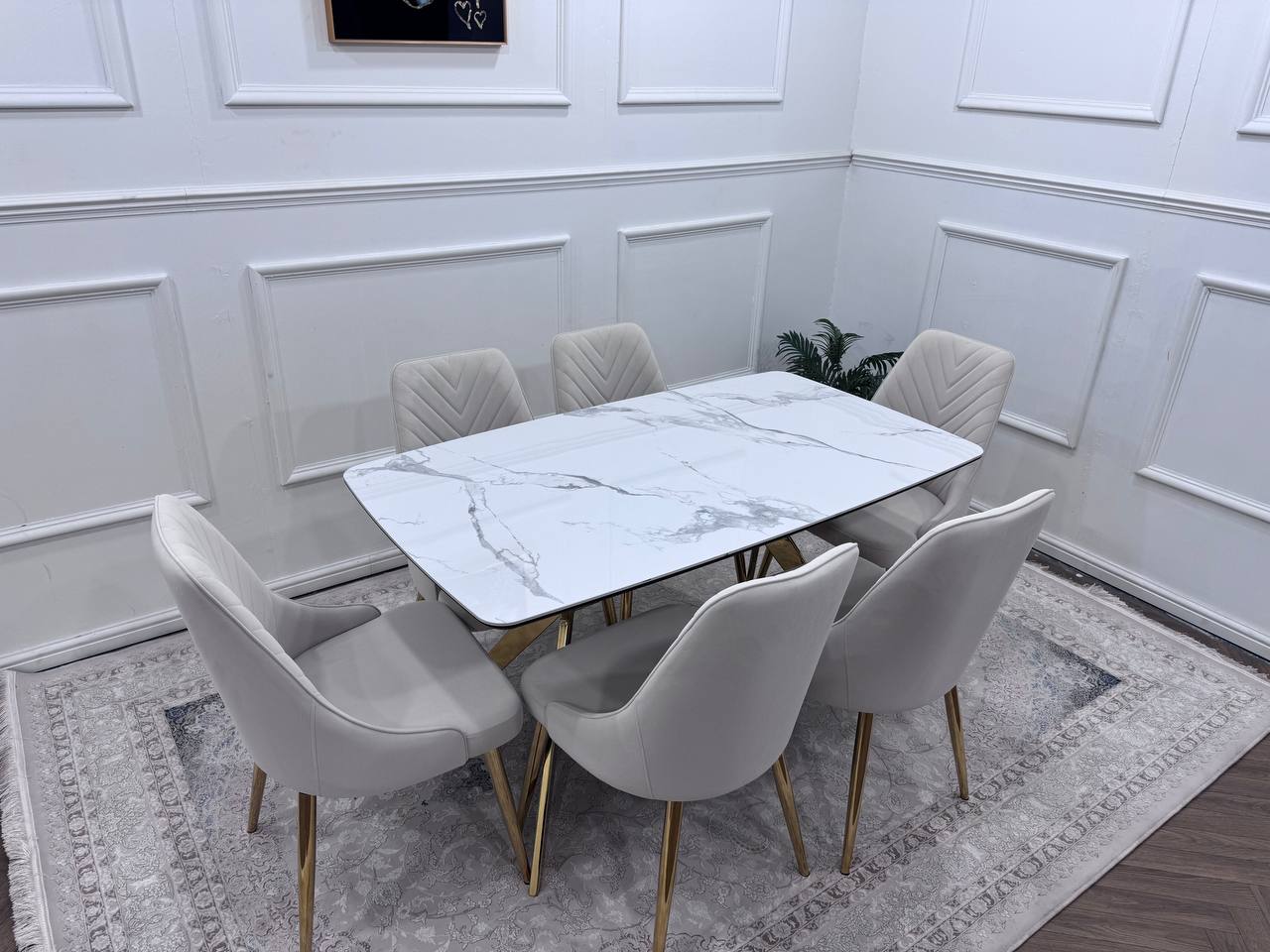 Q&amp;P Furniture Paris dining table set with a sleek wooden table and matching chairs, ideal for modern dining rooms.