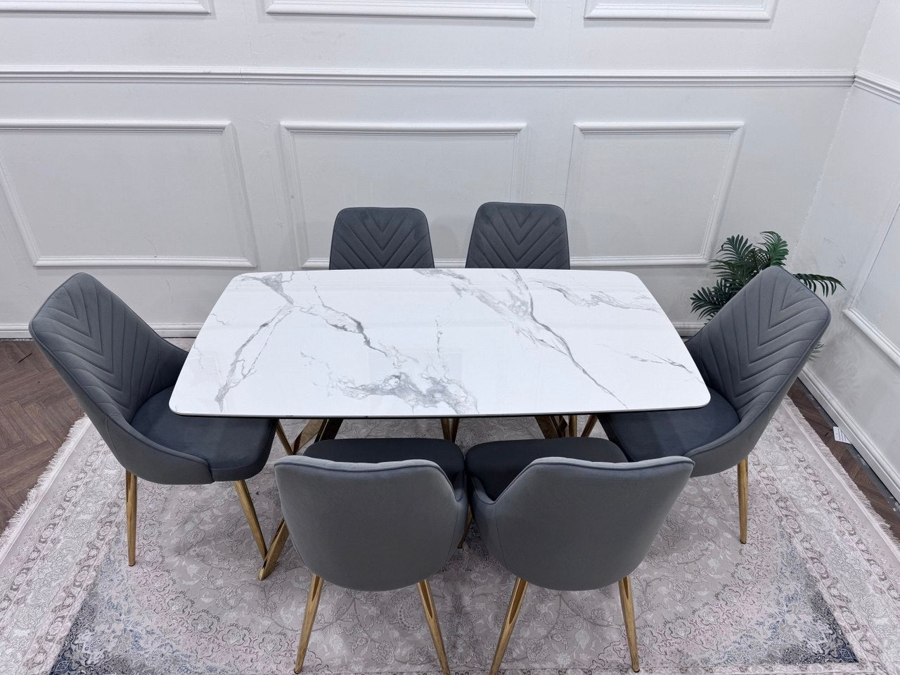Q&amp;P Furniture Paris dining table set with wooden table and matching chairs in a modern dining room setting.