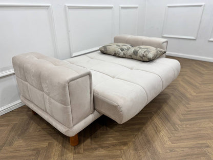 Q&amp;P Furniture Flora sofa set in luxurious velvet with plush cushions and modern design, ideal for stylish living room decor.