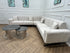 Q&P Furniture London corner sofa with plush cushions and modern design, shown in a cozy living room setting.