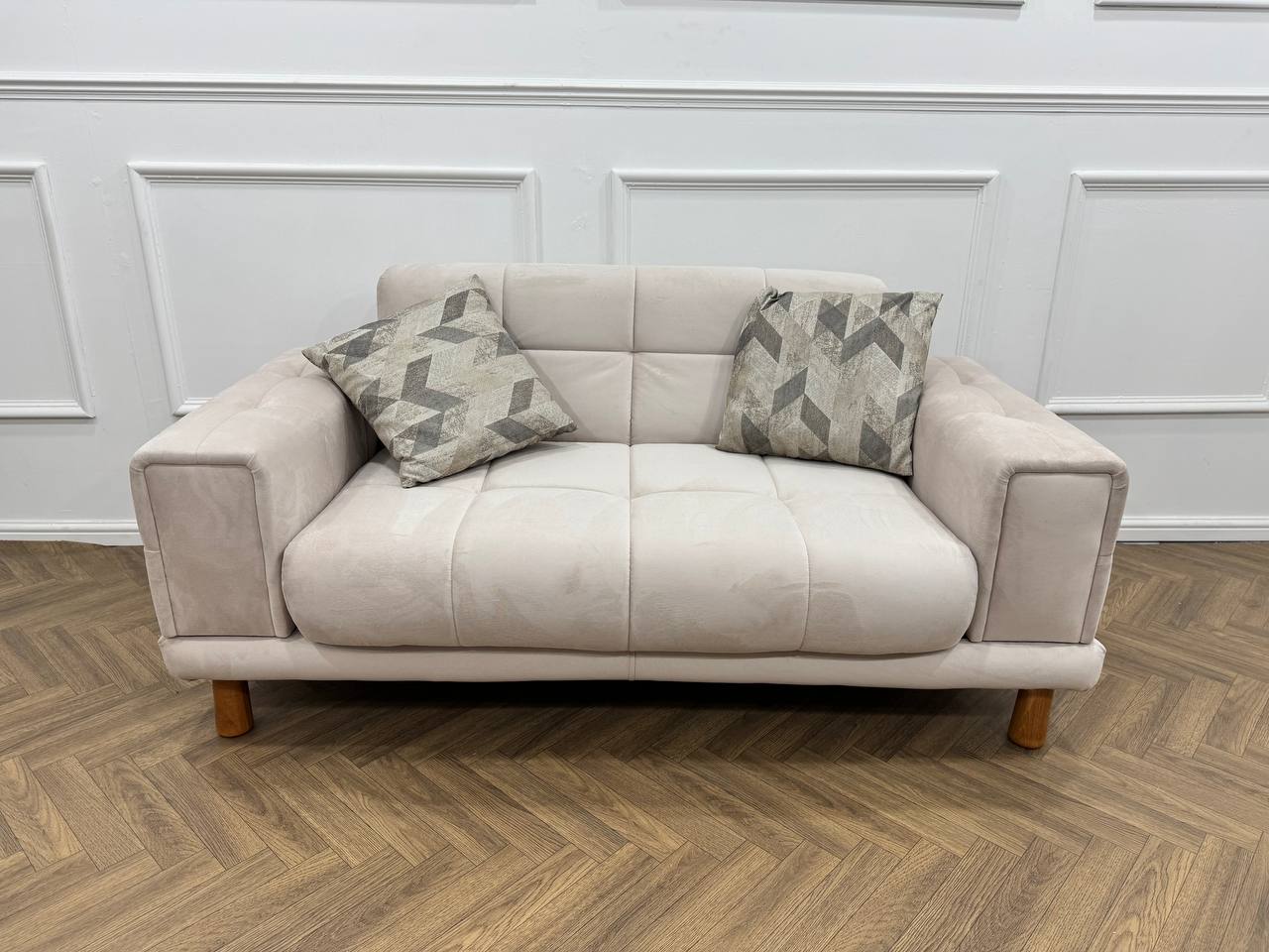 Q&amp;P Furniture Flora velvet sofa set with plush cushions and modern design, shown in a stylish living room setting.