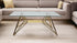 Q&P Furniture Leora coffee table with sleek wooden top and modern design, placed in a stylish living room setting.