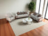 Q&P Furniture lilac sofa bed set featuring beige cushions, showcasing a modern and comfortable sofa with plush fabric upholstery.