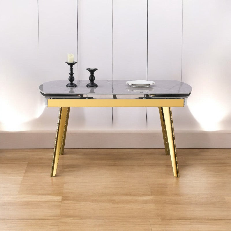 Enhance your dining experience with the Q&amp;P Furniture Grey Queen Dining Set. Spacious, stylish, and durable, this set is perfect for family dining and entertaining guests.