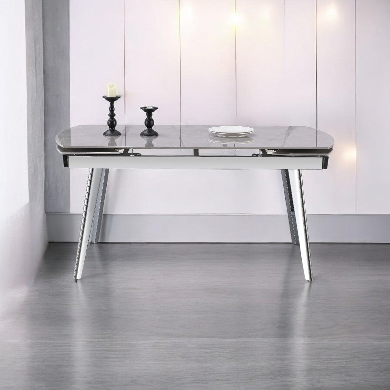 Enhance your dining experience with the Q&amp;P Furniture Grey Queen Dining Set. Spacious, stylish, and durable, this set is perfect for family dining and entertaining guests.