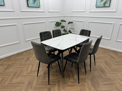 Q&amp;P Furniture Niva dining table with sleek wooden surface and sturdy legs for modern dining room decor.