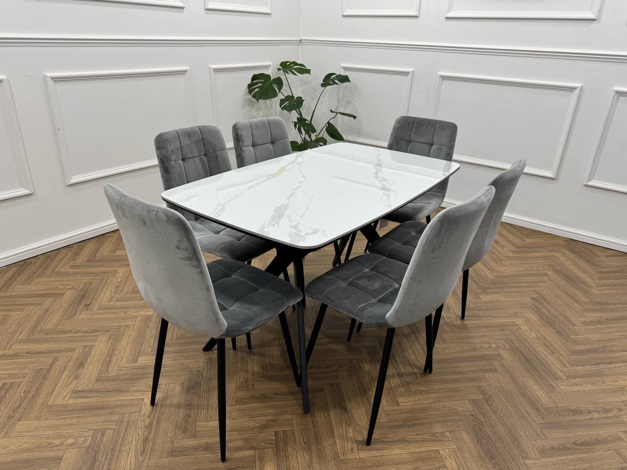 Q&amp;P Furniture Niva dining table with a sleek wooden surface and modern design, perfect for contemporary dining rooms.